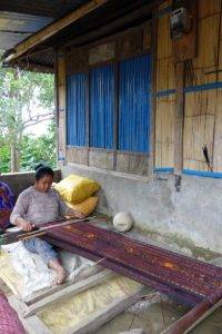 woman weaving ikat, moni, flores, indonesia 1