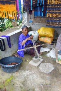 woman weaving ikat, moni, flores, indonesia